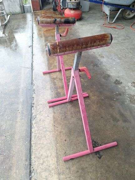 Two metal rolling stands (red)both one money
