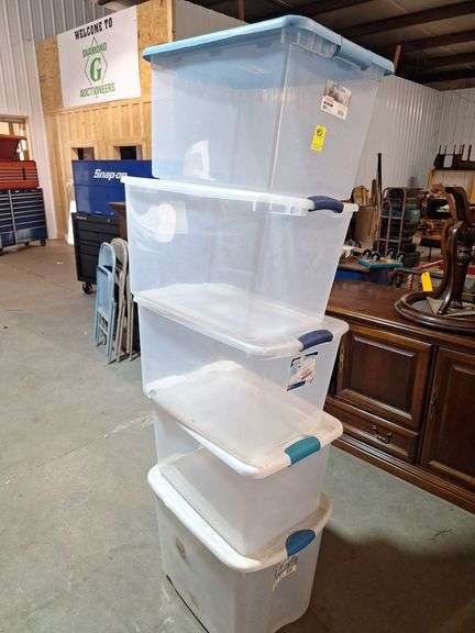 Five plastic clear totes with lids