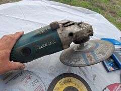 Makita 9'' Grinder with NEW 9'' Grinding Wheels & Replacements lens   (runs)