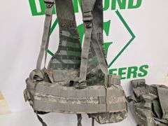 Four tactical vests, duffelbag and drop leg holster