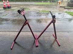 Two metal rolling stands (red)both one money