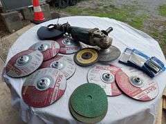 Makita 9'' Grinder with NEW 9'' Grinding Wheels & Replacements lens   (runs)