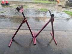 Two metal rolling stands (red)both one money
