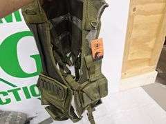 Four tactical vests, duffelbag and drop leg holster