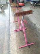 Two metal rolling stands (red)both one money