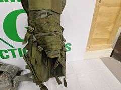 Four tactical vests, duffelbag and drop leg holster