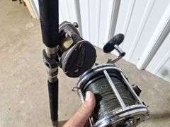 (2) PENN reels with (1) PENN Rod