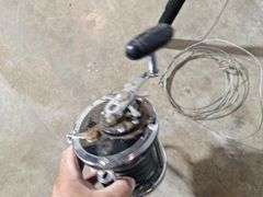 (2) PENN reels with (1) PENN Rod