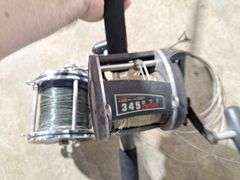 (2) PENN reels with (1) PENN Rod