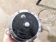 (2) PENN reels with (1) PENN Rod