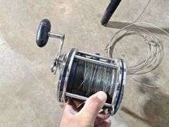 (2) PENN reels with (1) PENN Rod