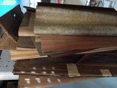 Large Assortment of Rolls and Sheets of Wood Veneer