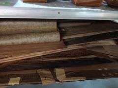 Large Assortment of Rolls and Sheets of Wood Veneer
