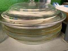 Assorted Pyrex Lids, Pie Plates, and Unmarked Baking Items