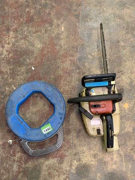 Snake and Stihl Chainsaw
