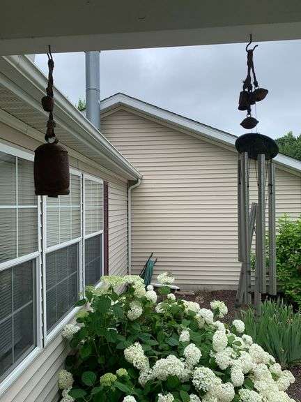 Collection of Wind Chimes on Front Porch