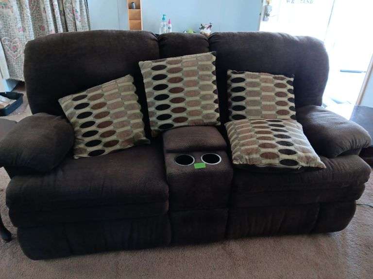 Overstuffed couch with storage & cup holders