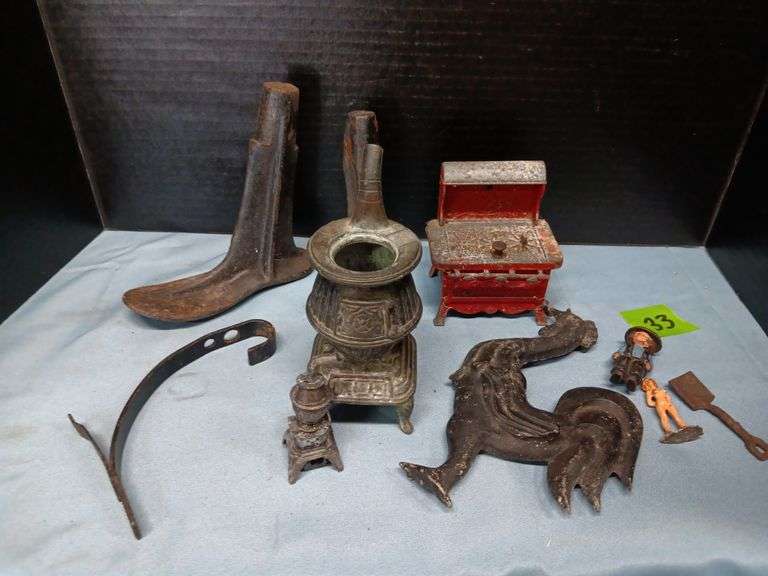 (3) Cast Iron Stoves , (2) Cast Iron Shoe Forms, and Cast Iron Figures