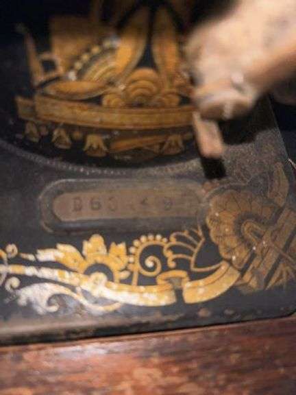 Singer sewing machine in cabinet • Basement •  ( Click for More Photos )