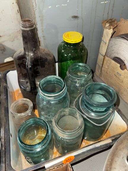 Glass jars and bottles • Basement