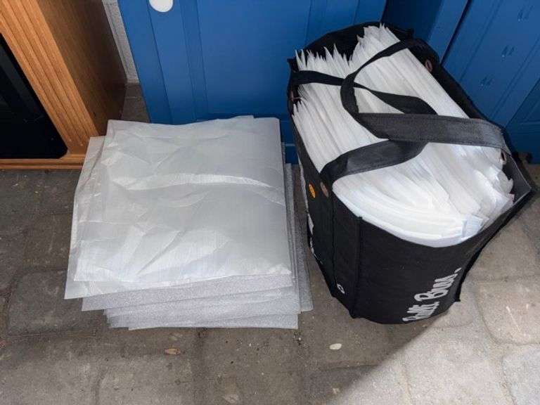 Bag of packing supplies • Garage
