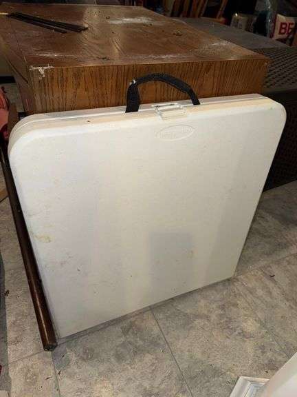 Folding Table • 4ft • Basement