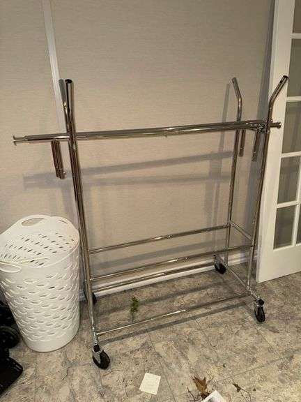 Clothes rack on casters • Basement