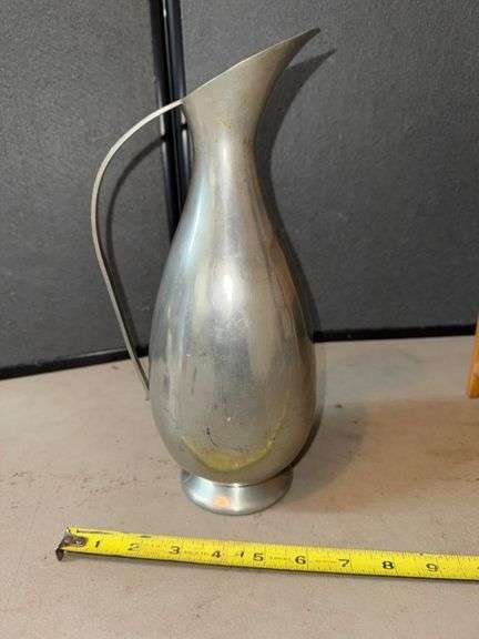 Metal pitcher • Basement