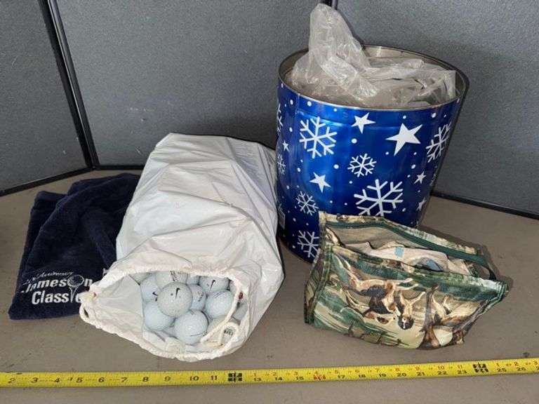 Golf lot, mostly golf balls • Garage