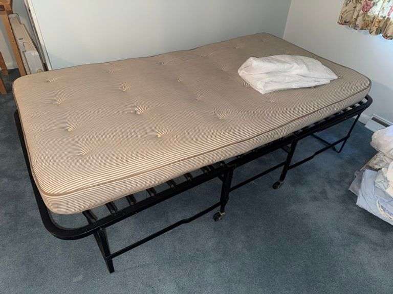 Twin size matress and folding cot • Bedroom 1