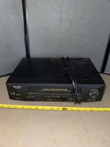 Sharp vhs player no remote • Kitchen