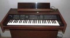 Gulbransen Electric Organ: 40" x 17" x 33 3/4", Stool: 24" x 12" x 23"