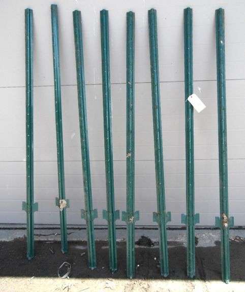 Eight Metal Fence Posts - Dunker Auction