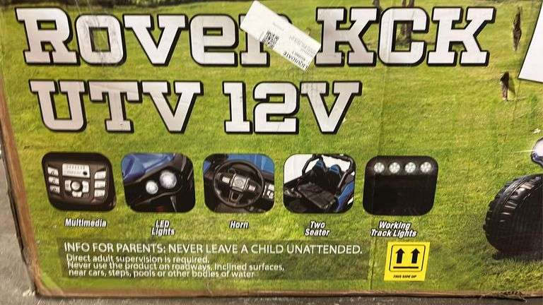 Old Rover Utv 12V ROVER KCK UTV RIDE ON IN BOX - BLUE - Earl's Auction Company