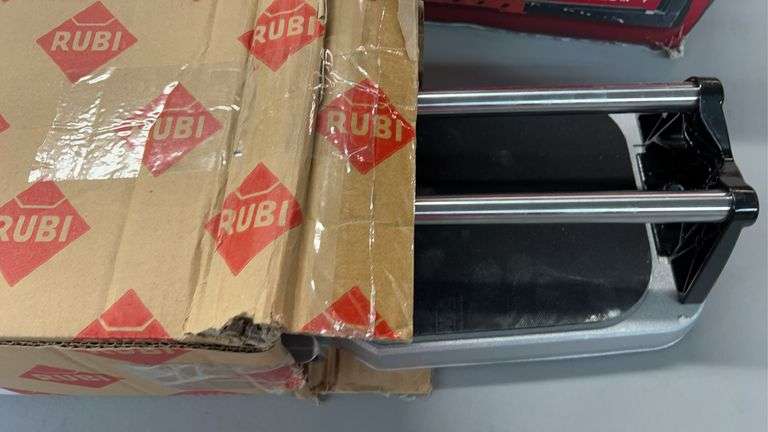 AS IS - (2) TILE CUTTERS IN BOXES - HUSKY & RUBI