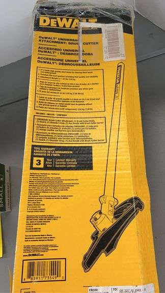 DEWALT UNIVERSAL BRUSH CUTTER ATTACHMENT IN BOX