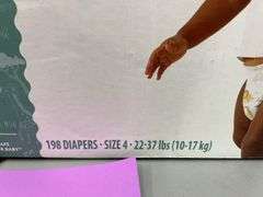 BOX OF DIAPERS - SIZE 4