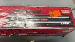 AS IS - (2) TILE CUTTERS IN BOXES - HUSKY & RUBI