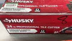 AS IS - (2) TILE CUTTERS IN BOXES - HUSKY & RUBI
