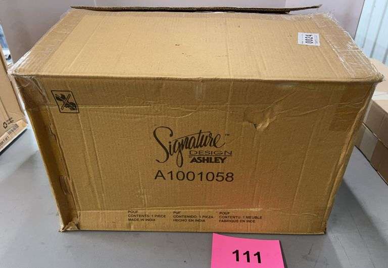 ASHLEY SIGNATURE DESIGN POUF IN BOX