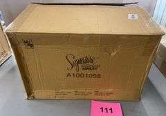 ASHLEY SIGNATURE DESIGN POUF IN BOX