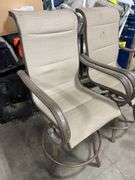 AS IS - (4) ALL WEATHER SWIVEL PATIO CHAIRS - BROWN