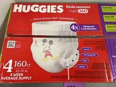 BOX OF HUGGIES DIAPERS - SIZE 4
