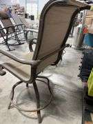 AS IS - (4) ALL WEATHER SWIVEL PATIO CHAIRS - BROWN