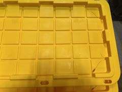 AS IS - (4) PLASTIC STORAGE TOTES W/ LIDS - BLACK & YELLOW