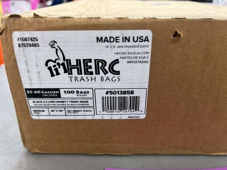 BOX OF TRASH BAGS & PACK OF TOWELS