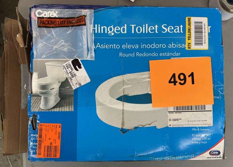 CAREX HINGED TOILET SEAT RISER IN BOX - Earl's Auction Company