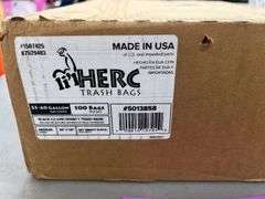 BOX OF TRASH BAGS & PACK OF TOWELS