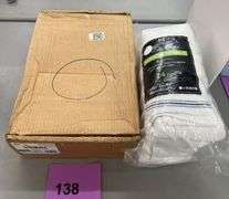 BOX OF TRASH BAGS & PACK OF TOWELS