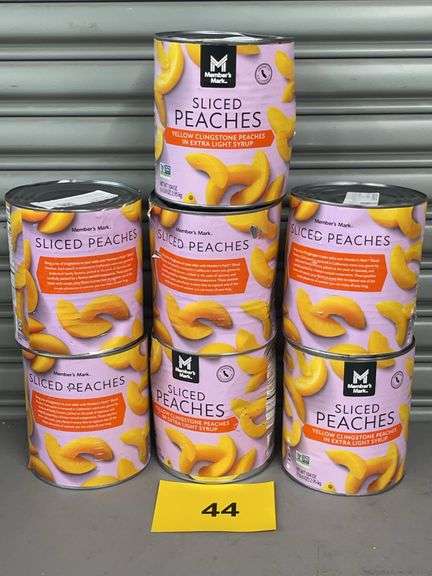(7) CANS OF SLICED PEACHES